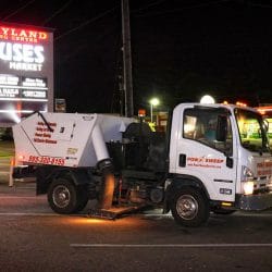 Power Sweeping in Retail Parking Lot with Truck