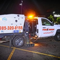 Power Sweeping in Retail Parking Lot with Truck