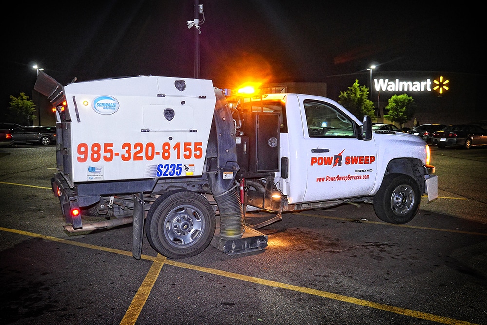 Power Sweeping in Retail Parking Lot with Truck