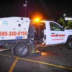Power Sweeping in Retail Parking Lot with Truck