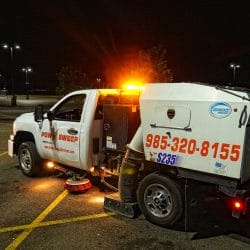 Power Sweeping in Retail Parking Lot with Truck