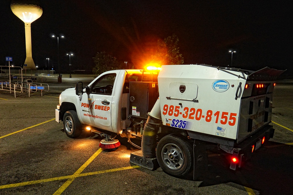 Power Sweeping in Retail Parking Lot with Truck