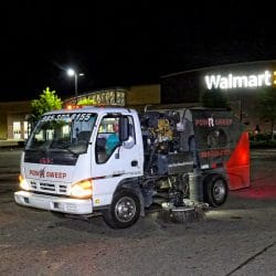 Power Sweeping in Retail Parking Lot with Truck