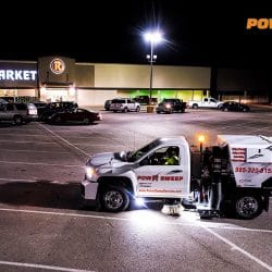 Power Sweeping in Retail Parking Lot with Truck